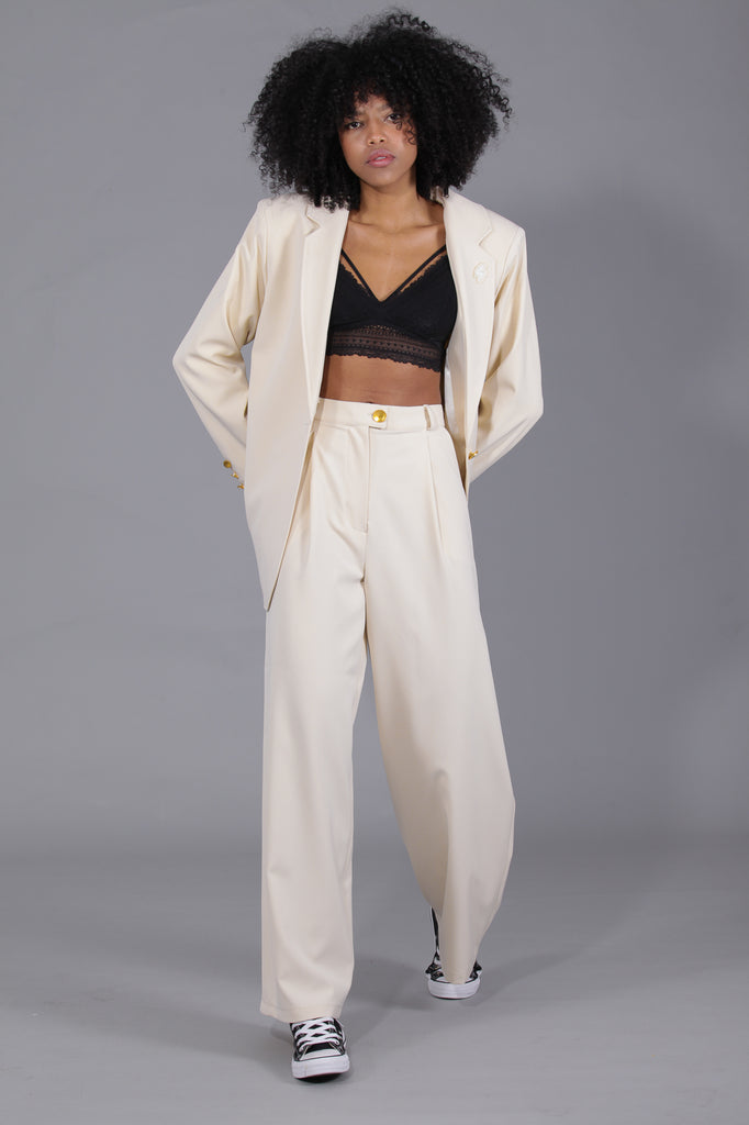 Pantalón traje holgado · CRUDO ·